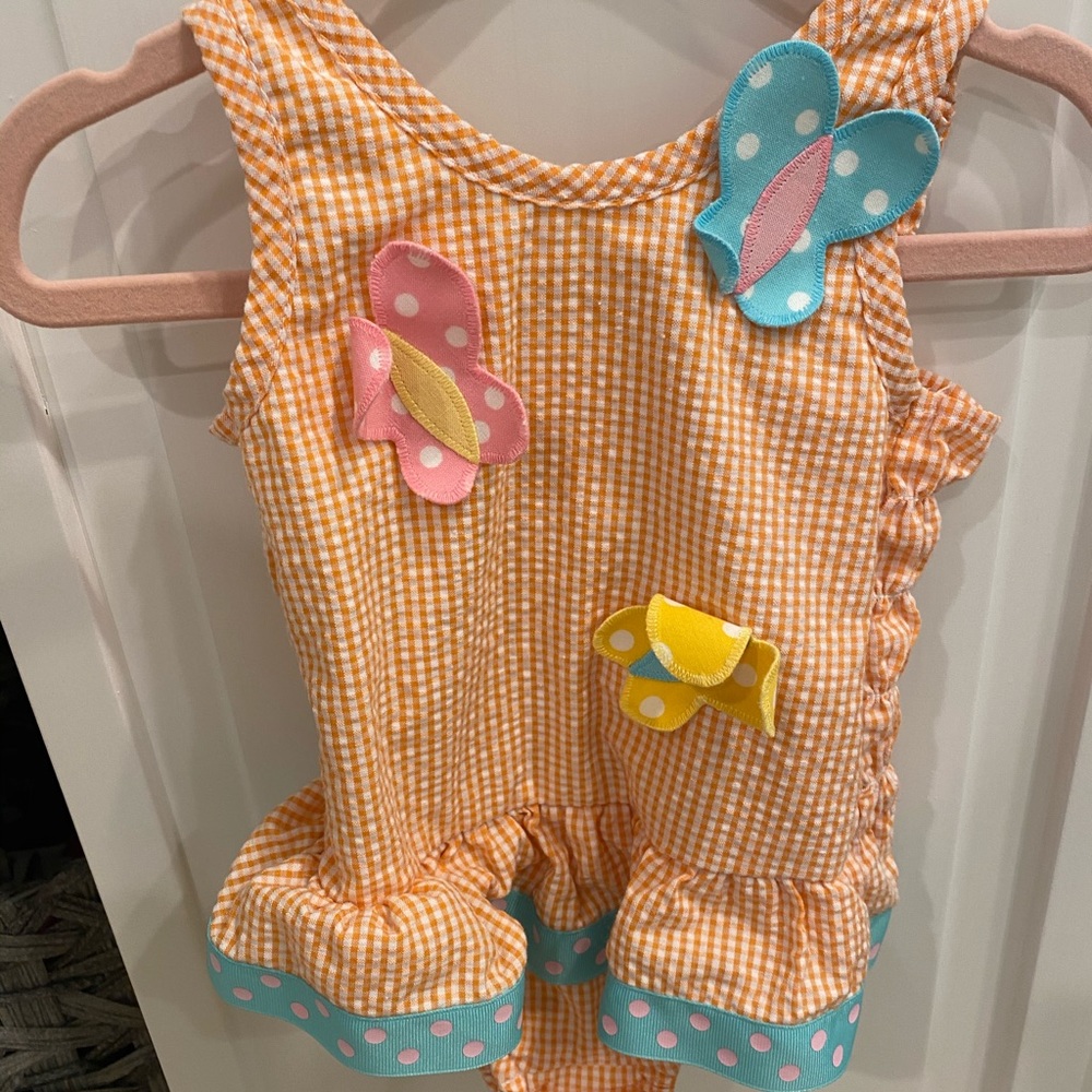 Adorable smocked sunsuit! Boutique. Soooo cute.